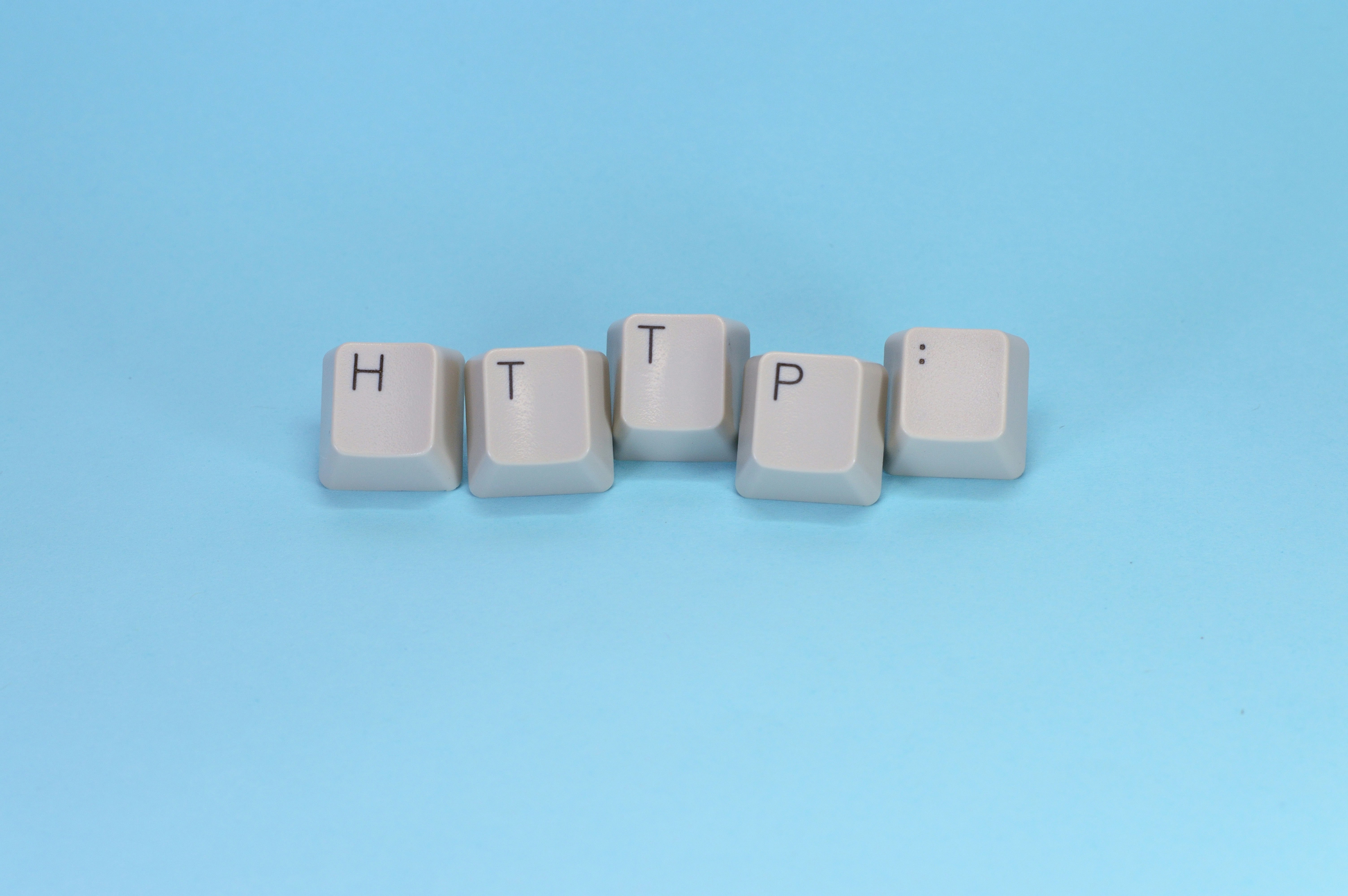 An image of keyboard keys that read "HTTP:"